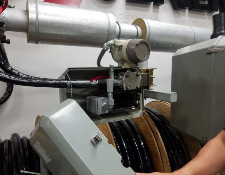 Controller enclosure and cable reel at the start of a pull